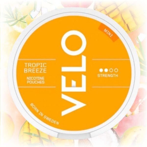 VELO Tropic Breeze Mini nicotine pouches in a sleek tin with tropical fruit flavors.